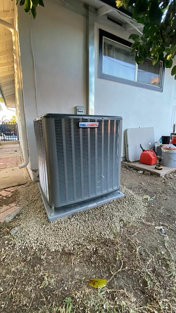 a photo of a cooling system outside a house